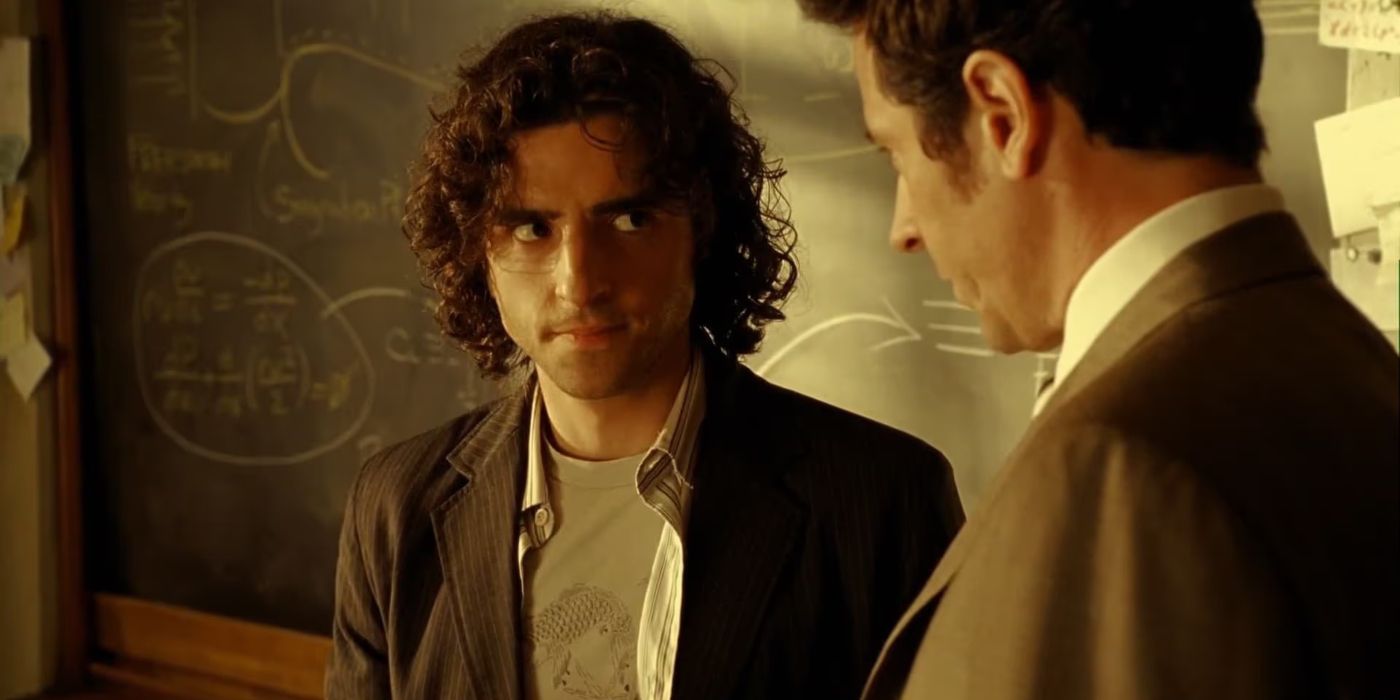 David Krumholz and Rob Morrow in front of a whiteboard of equations on Numb3rs
