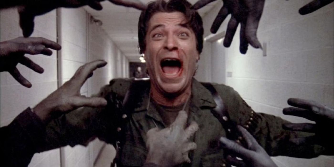 A man screaming while hands reach out to him in Day of the Dead - 1985 (1)