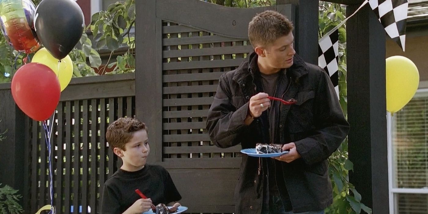 Dean with his son eating cake on Supernatural