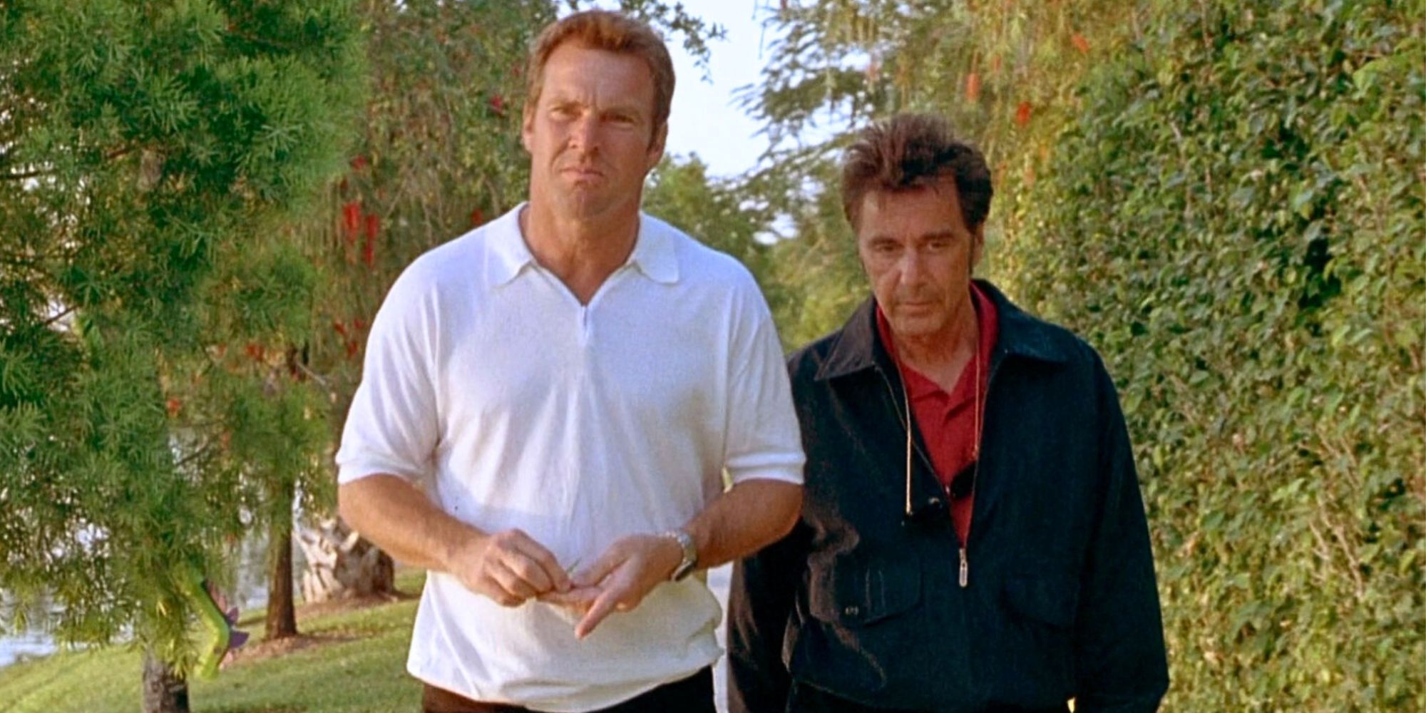 Dennis Quaid and Al Pacino walking side by side in Any Given Sunday (1999)