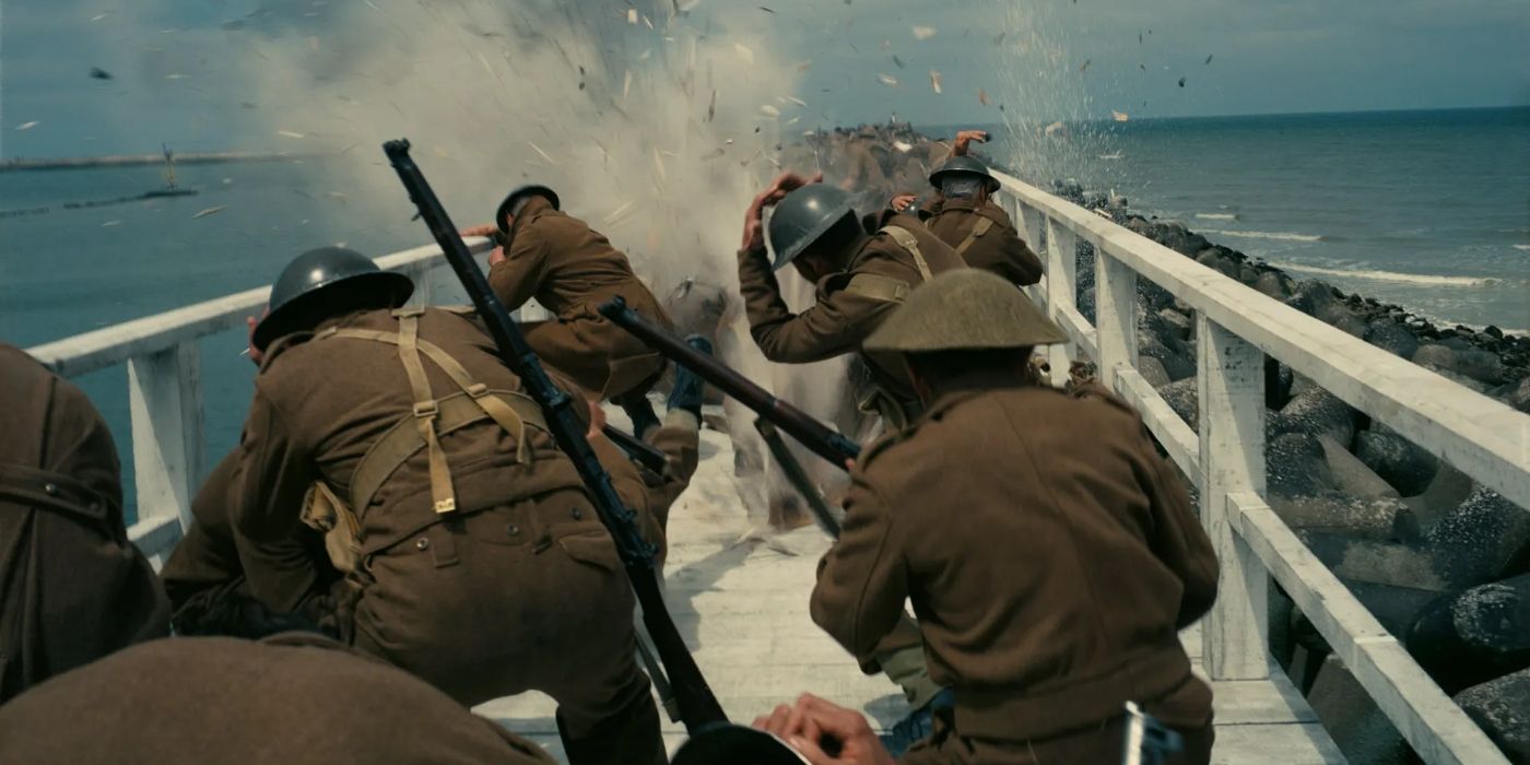 A group of soldiers shield themselves from an explosion in Dunkirk