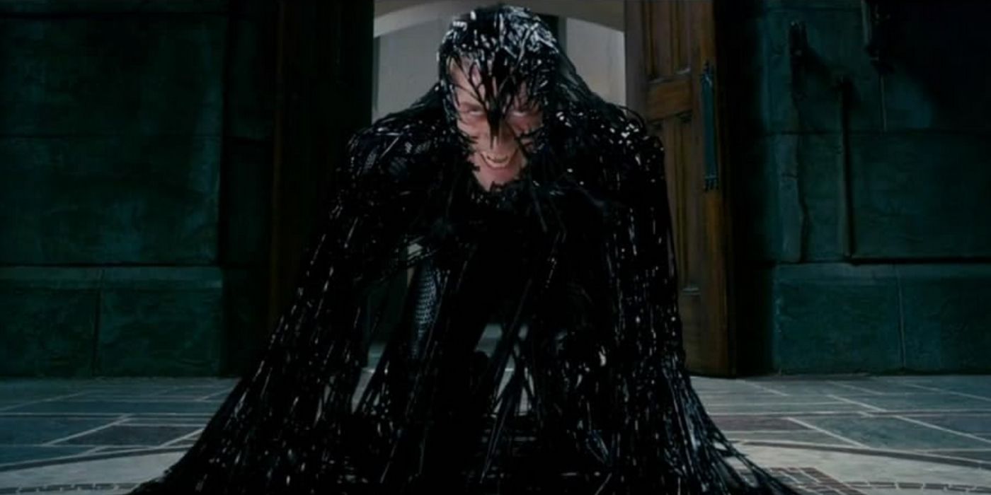 Eddie Brock (Topher Grace) on the ground, being taken over by the symbiote in Spider-Man 3