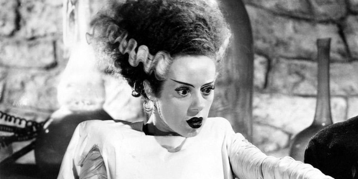 The Bride pointing at something off-camera in Bride of Frankenstein