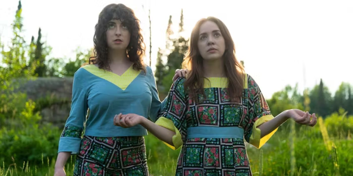 Evany Rosen next to Kayla Lorette in the middle of a field in a 'New Eden' still
