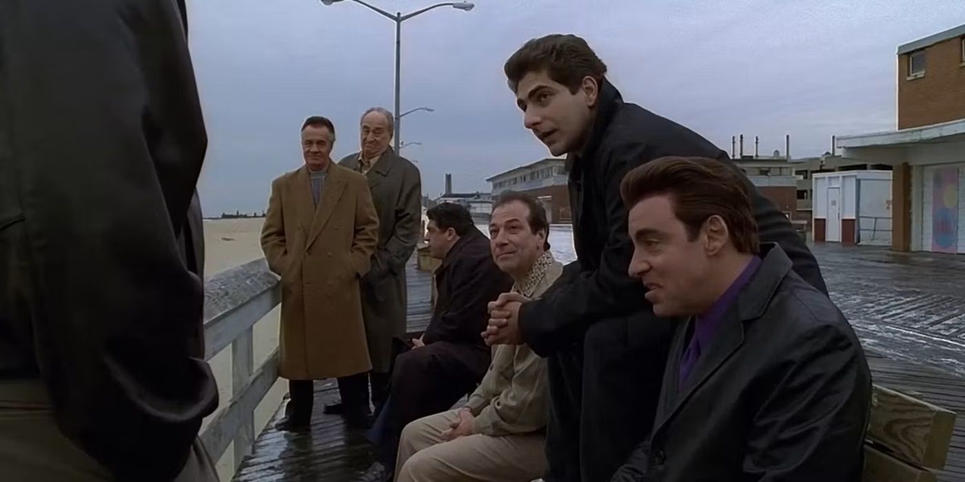 The Sopranos cast sitting together on a boardwalk in The Sopranos episode "Funhouse"