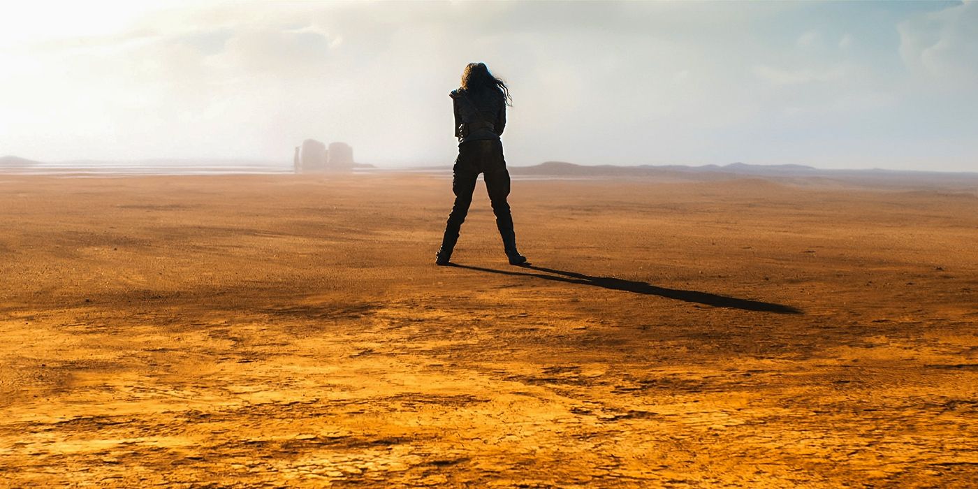 Anya Taylor Joy standing in the desert in Furiosa: A Mad Max Saga