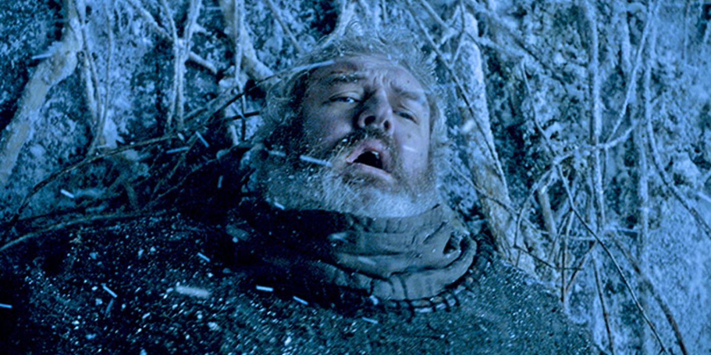 Hodor (Kristian Nairn) holding a door in the snow so his friends can escape the wights in Game of Thrones.