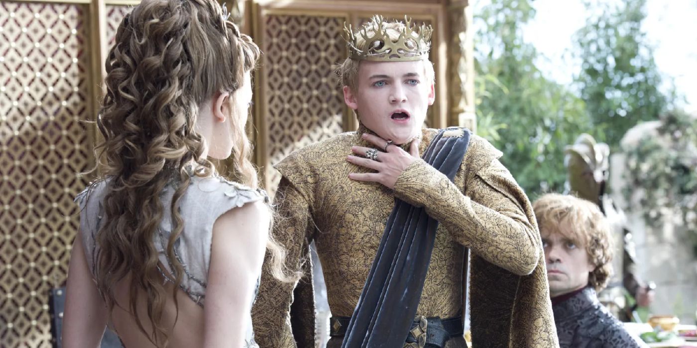 King Joffrey (Jack Gleeson) begins choking as he talks to Lady Margery (Natalie Dormer) at their wedding and Tyrion Lannister (Peter Dinklage) watches on.