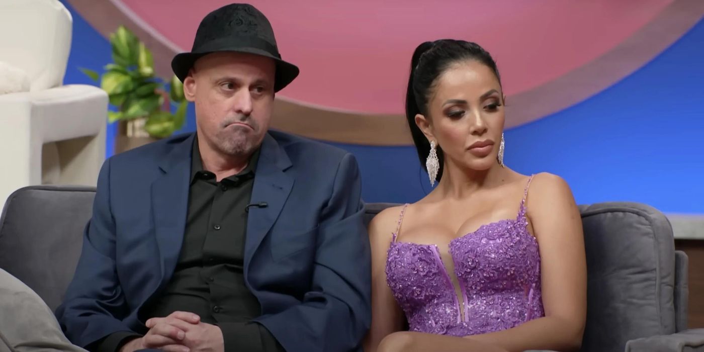 Gino and Jasmine sit on a couch in '90 Day Fiancé_ Couples Tell All'