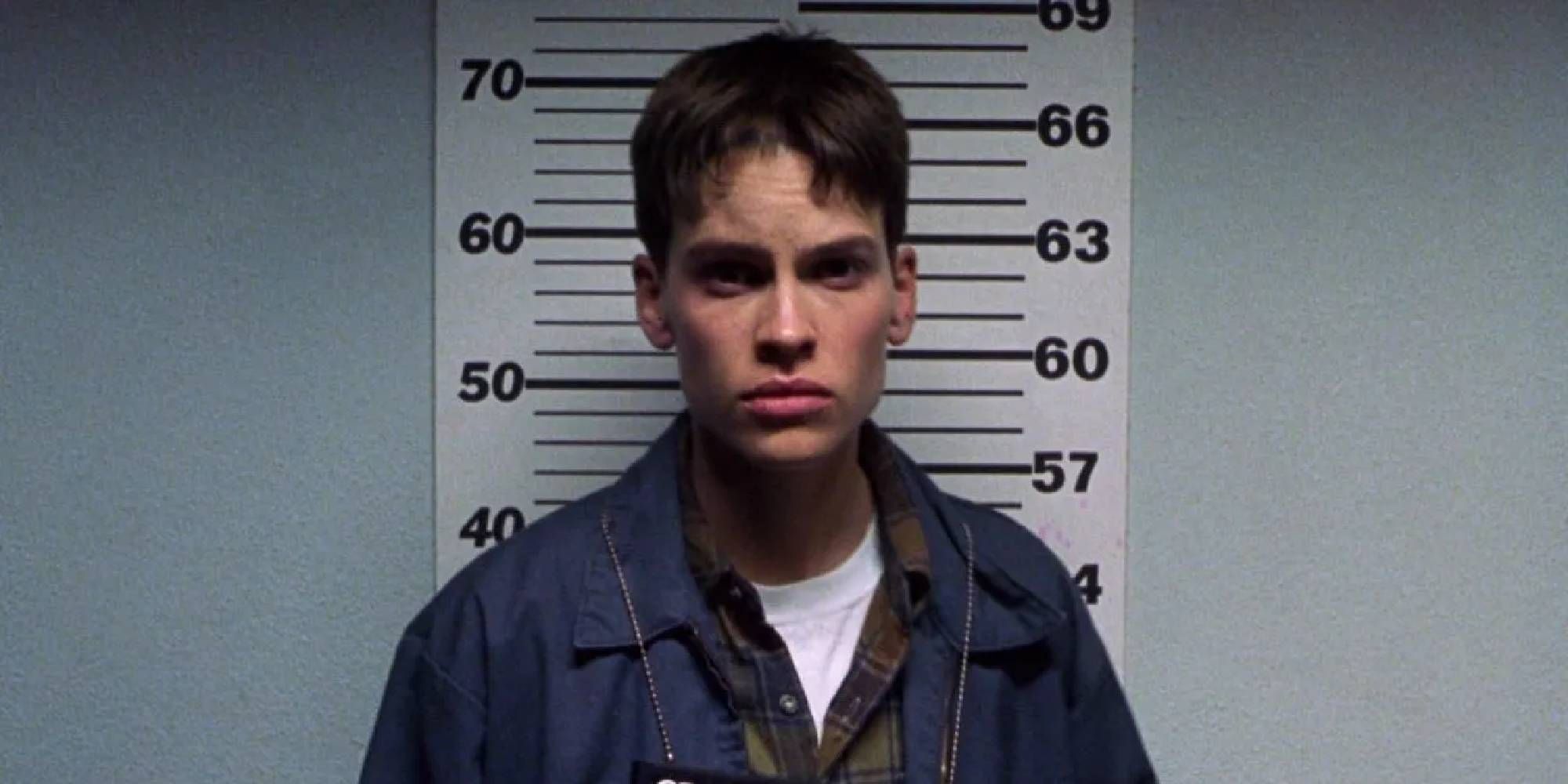 Hilary Swank mugshot in Boys Don't Cry looking serious.
