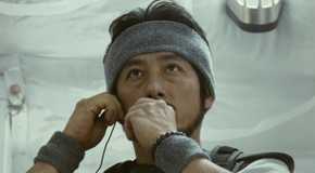 Hiroyuki Sanada talks into a com system aboard a spaceship in 'Sunshine'.