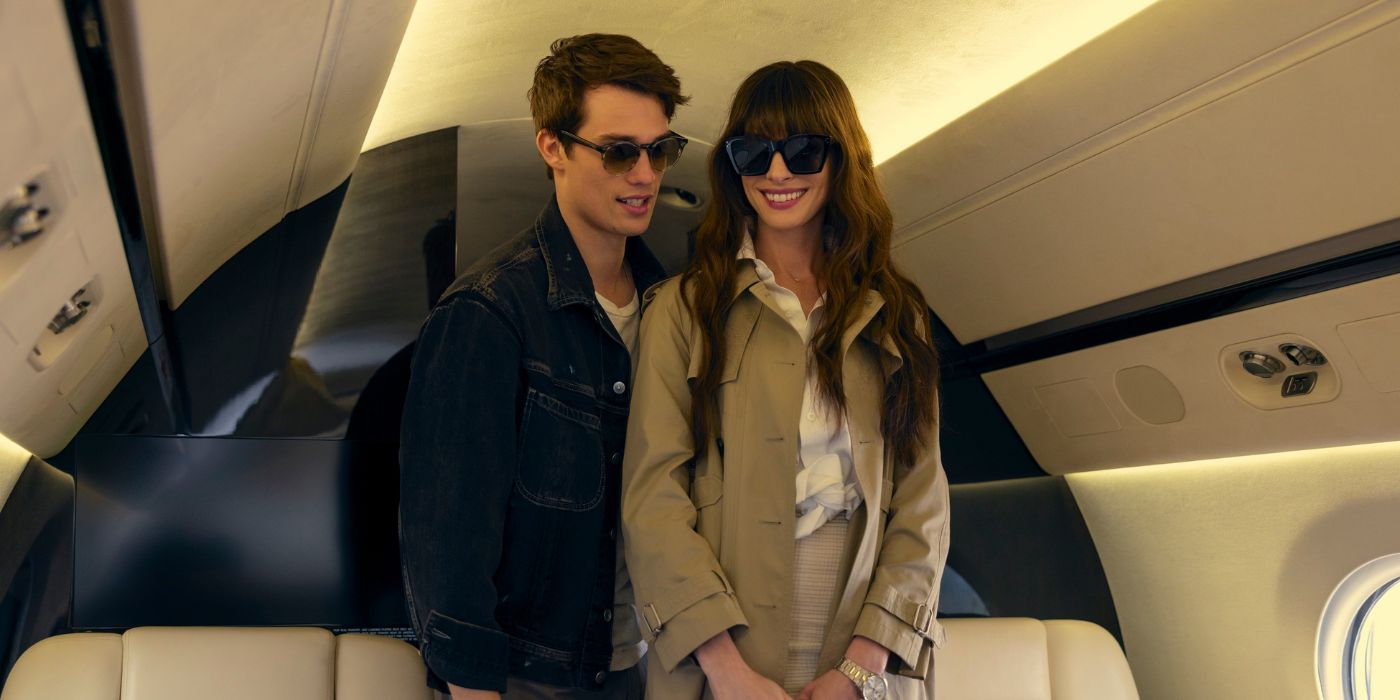Nicholas Galitzine and Anne Hathaway as Solène and Hayes on a private plane wearing sunglasses in The Idea of You