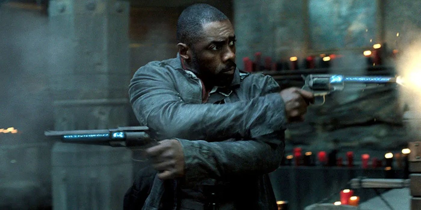 Idris Elba as Roland Deschain firing two guns in The Dark Tower