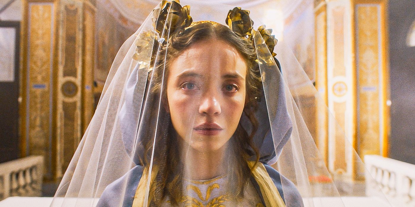 Sydney Sweeney as Cecilia looking concerned and wearing a veil in Immaculate. 