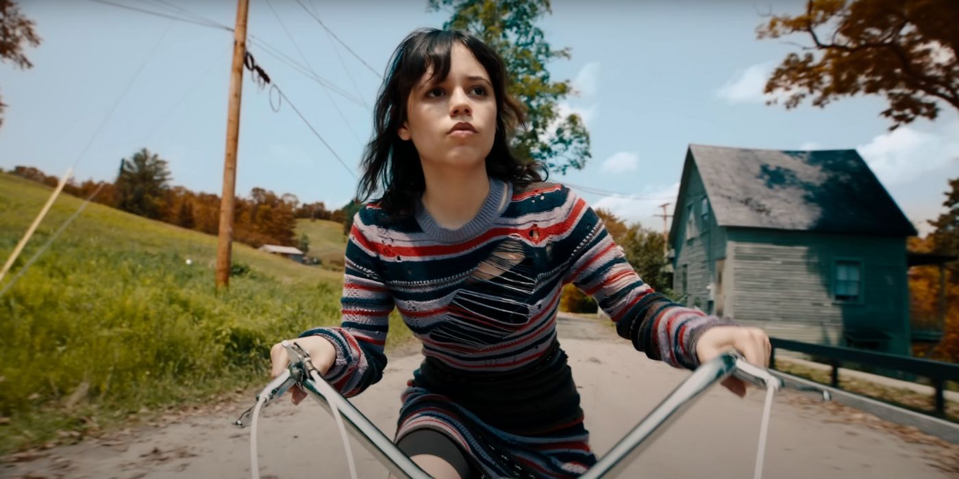 Astrid Deetz riding a bike in Beetlejuice, Beetlejuice.