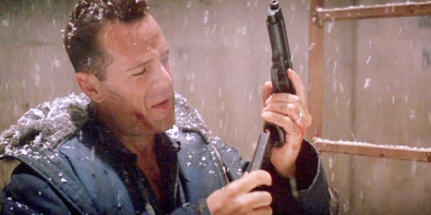 John McClane (Bruce Willis) reloads his gun in 'Die Hard 2'