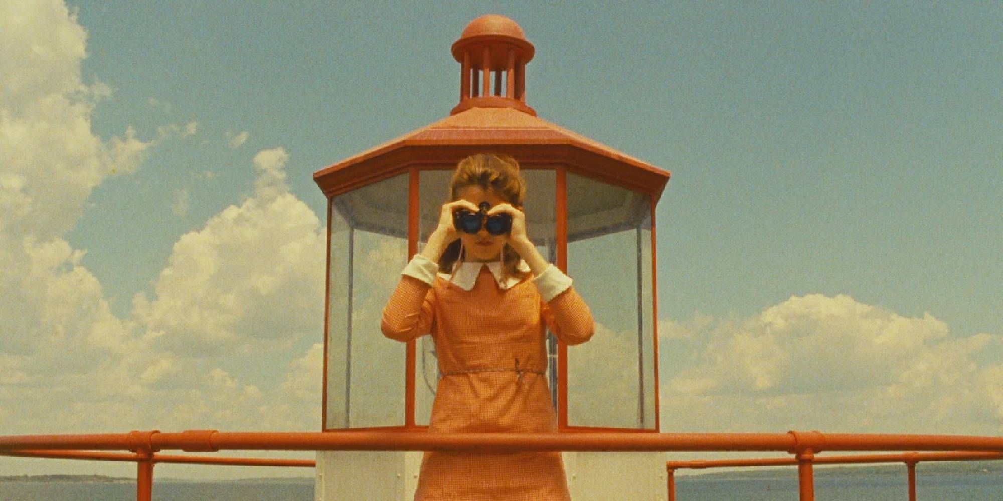 Kara Hayward in Moonrise Kingdom looks out with binoculars.