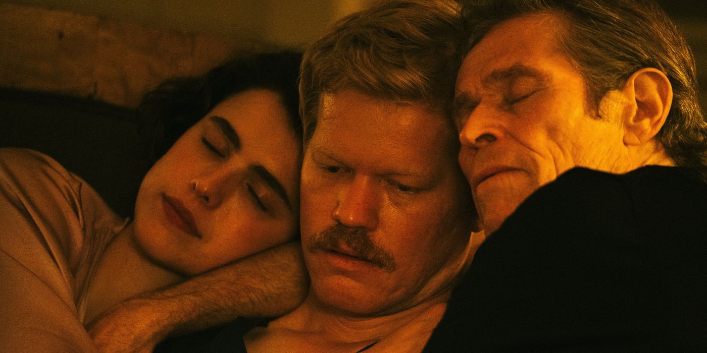 Margaret Qualley and Willem Dafoe sleeping on Jesse Plemons' shoulders in Kinds of Kindness.