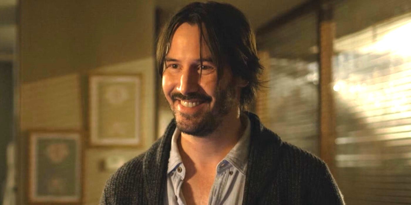 Keanu Reeves as Evan smiling broadly in Knock Knock