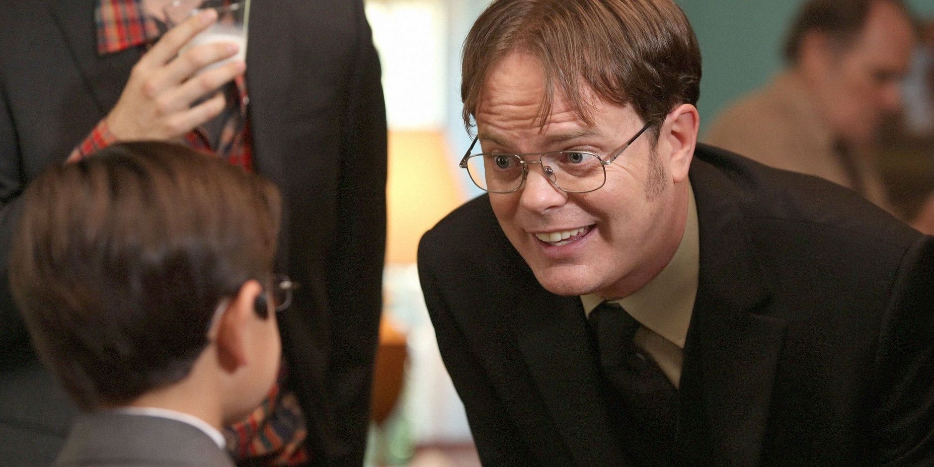 Rainn Wilson as Dwight talks to Cameron, played by Blake Garrett Rosenthal, in The Office's episode The Farm