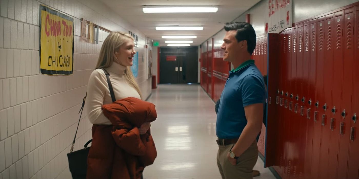 Lily Rabe holds her coat while talking to Finn Wittrock in a high school hallway in Downtown Owl 
