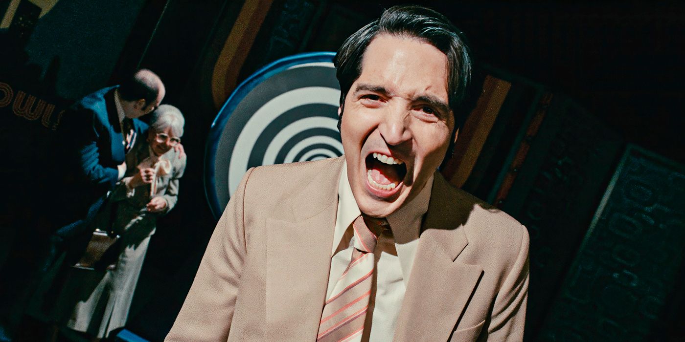 David Dastmalchian as Jack Delroy screaming on a television set in Late Night with the Devil. 