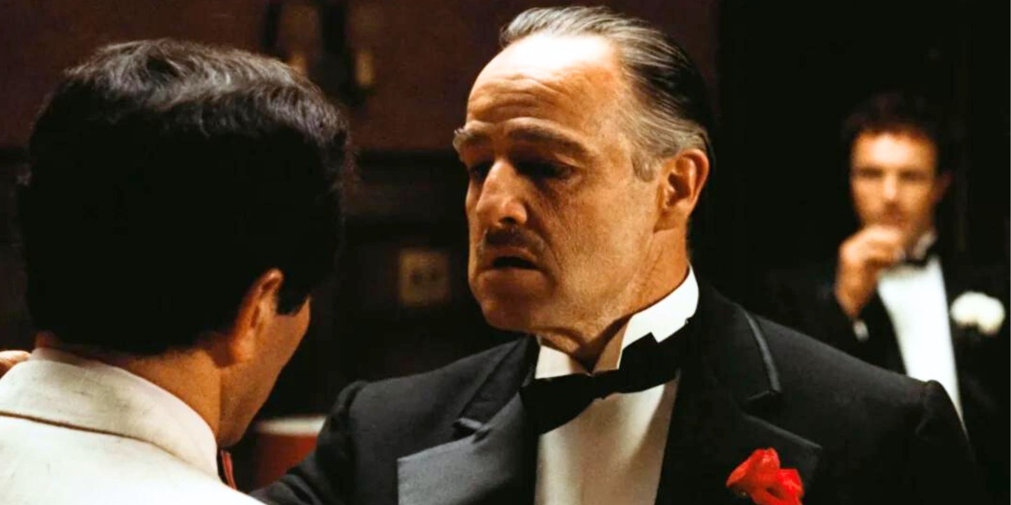 Marlon Brando speaking to someone in The Godfather (1972)