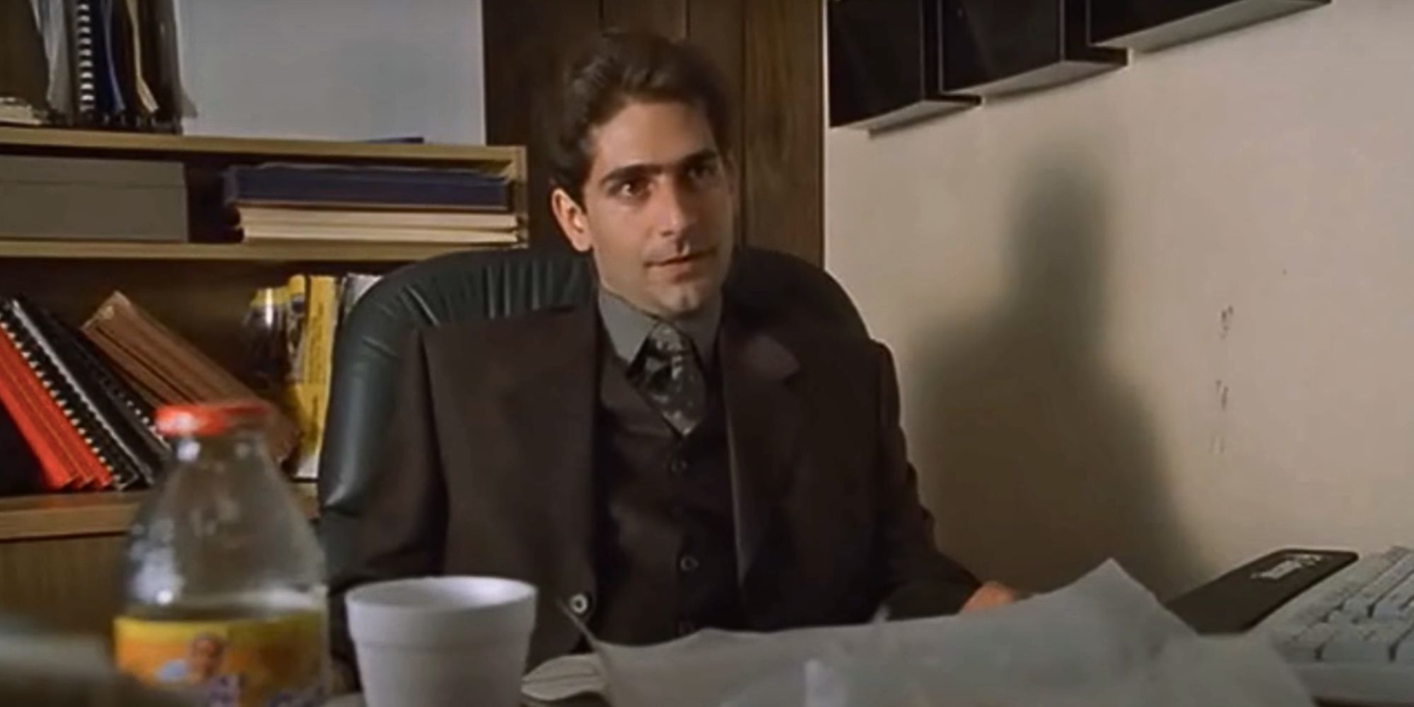 Michael Imperioli sitting at a desk in The Sopranos
