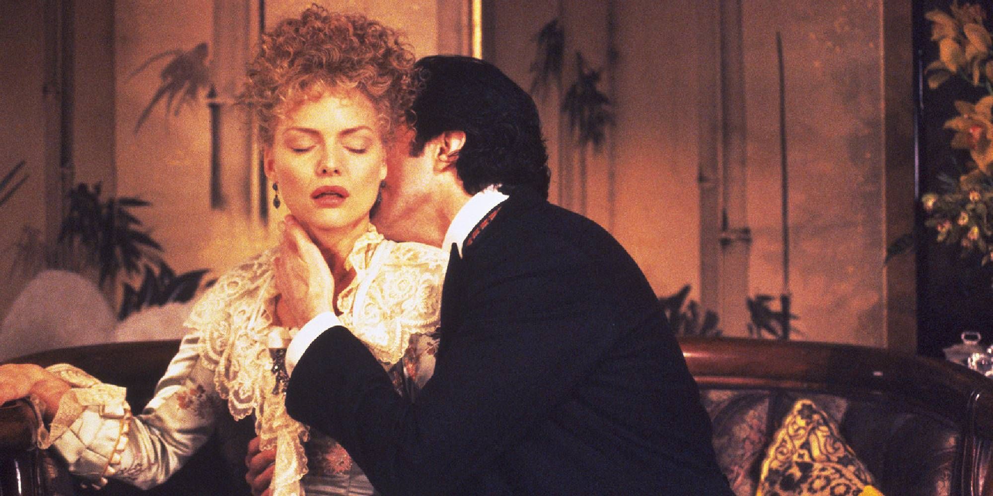 Daniel Day-Lewis kissing Michelle Pfeiffer&rsquo;s neck in The Age of Innocence.
