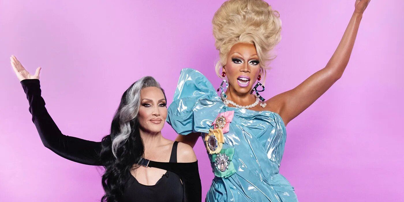 Michelle Visage and RuPaul pose and smile