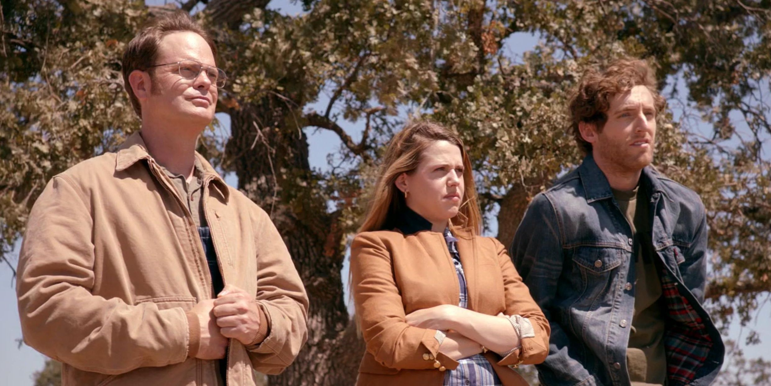 Rainn Wilson, Majandra Delfino and Thomas Middleditch stand side by side as Dwight, Fannie, and Jeb in The Office's The Farm