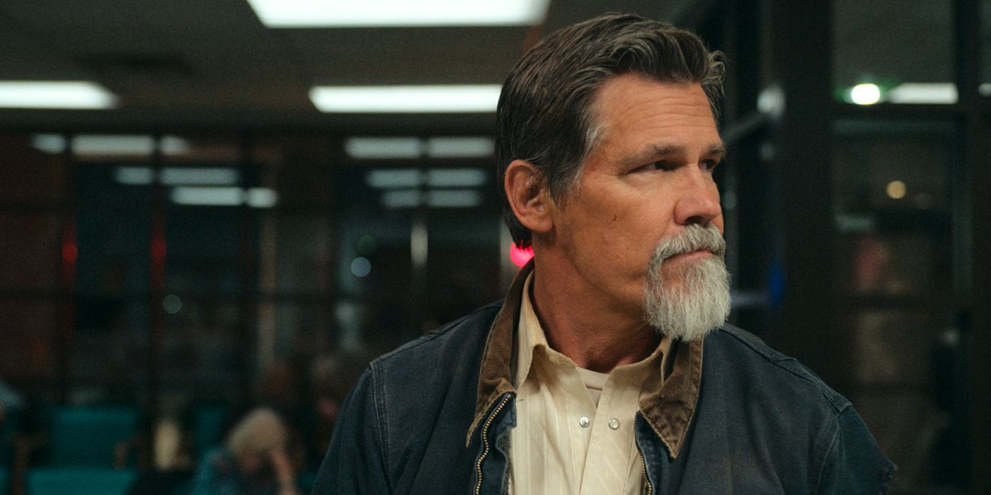 Josh Brolin and his white goatee glance off to the side in Outer Range