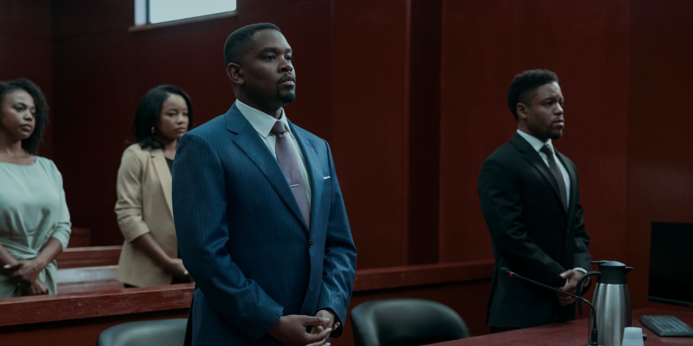 Aml Ameen and Jon Michael Hill stand in a courtroom in 'A Man in Full'