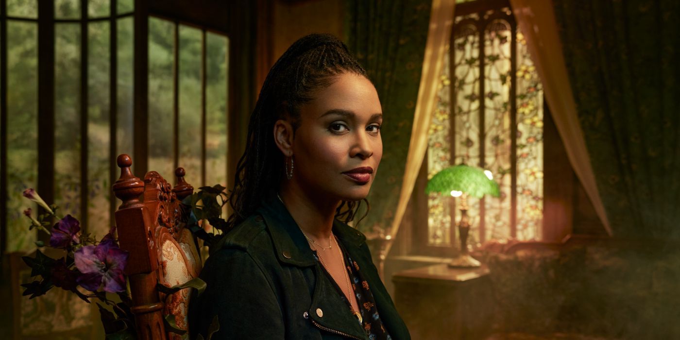 Joy Bryant as Helen Grace in front of ornate windows in 'The Spiderwick Chronicles'