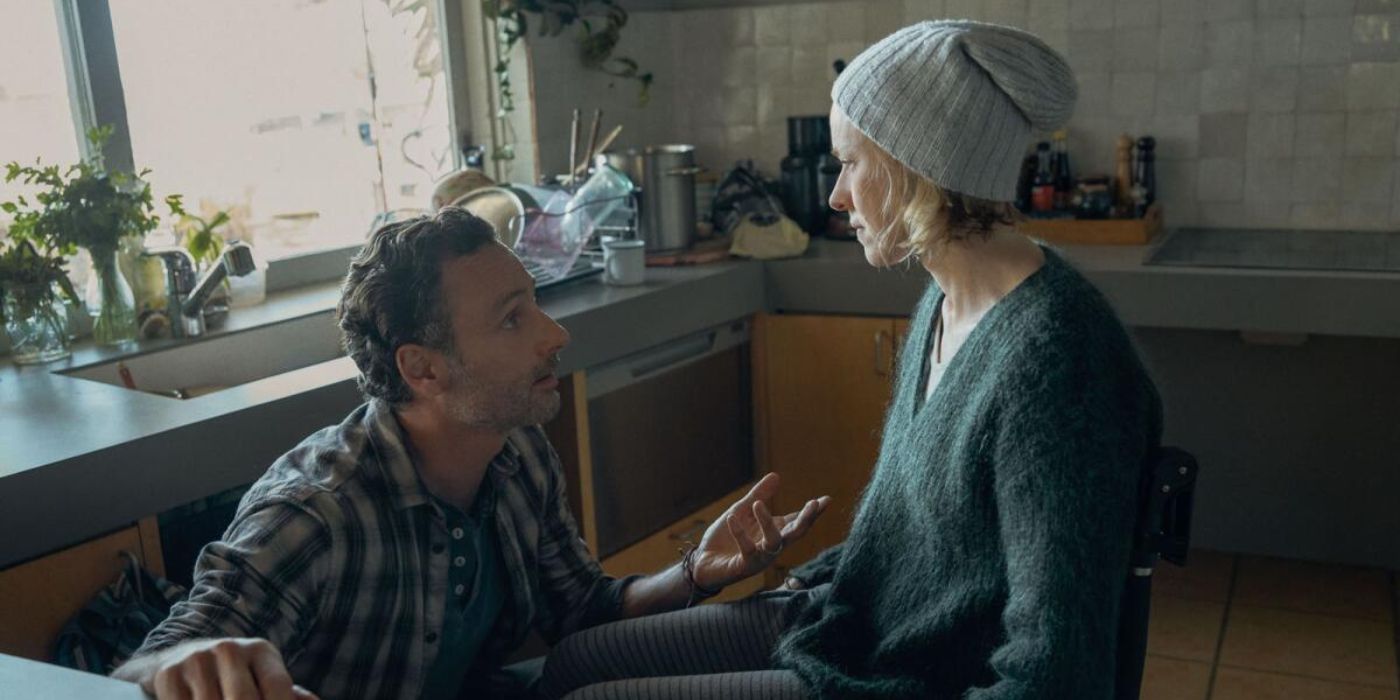 Cameron Bloom (Andrew Lincoln) kneels before his wife, a wheelchair-bound Sam Bloom (Naomi Watts), imploring her to do something while she stares at him blankly in 'Penguin Bloom' (2020)