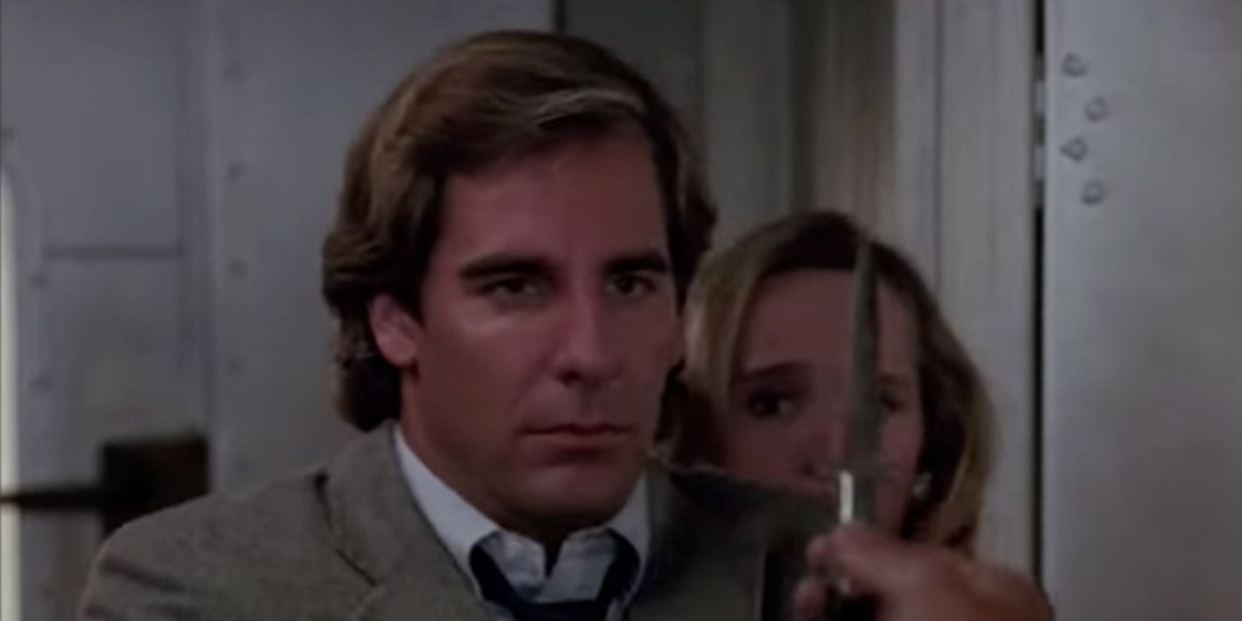 Scott Bakula in Quantum Leap, someone holding a knife in front of him