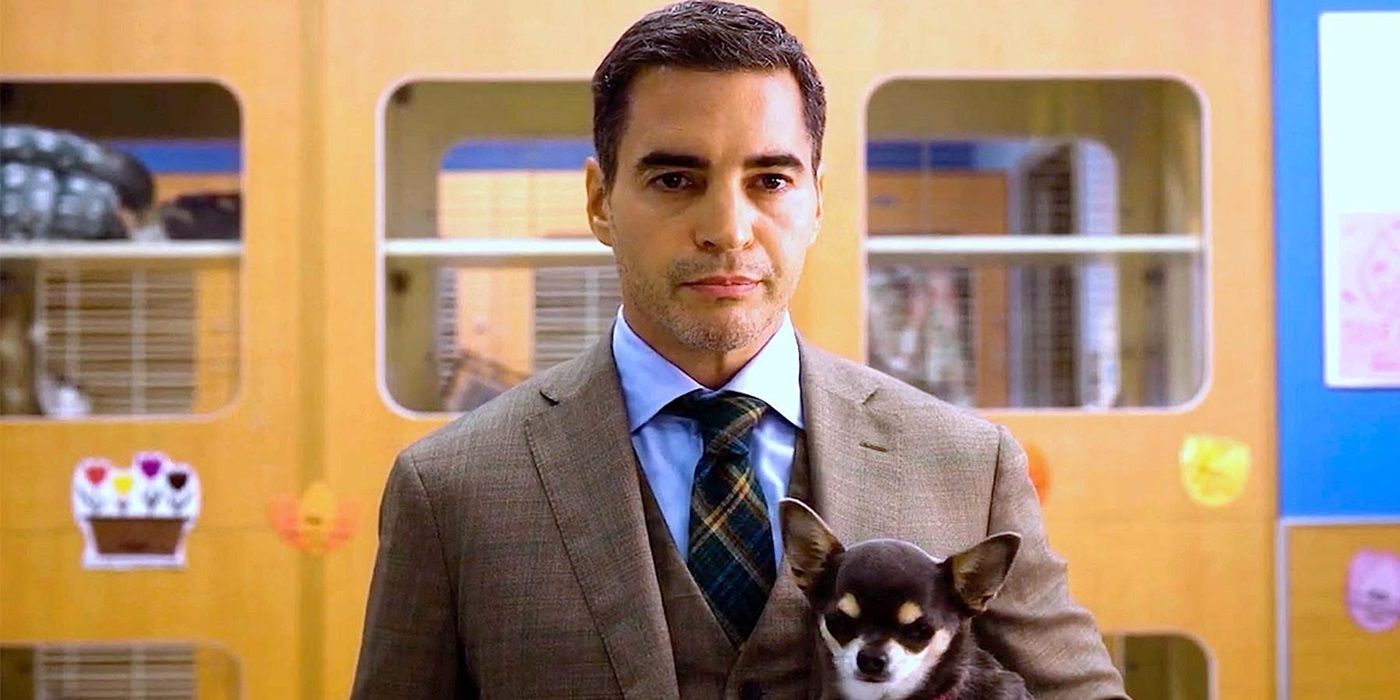 Ramon Rodriguez as Will Trent holding a chihuahua in Will Trent