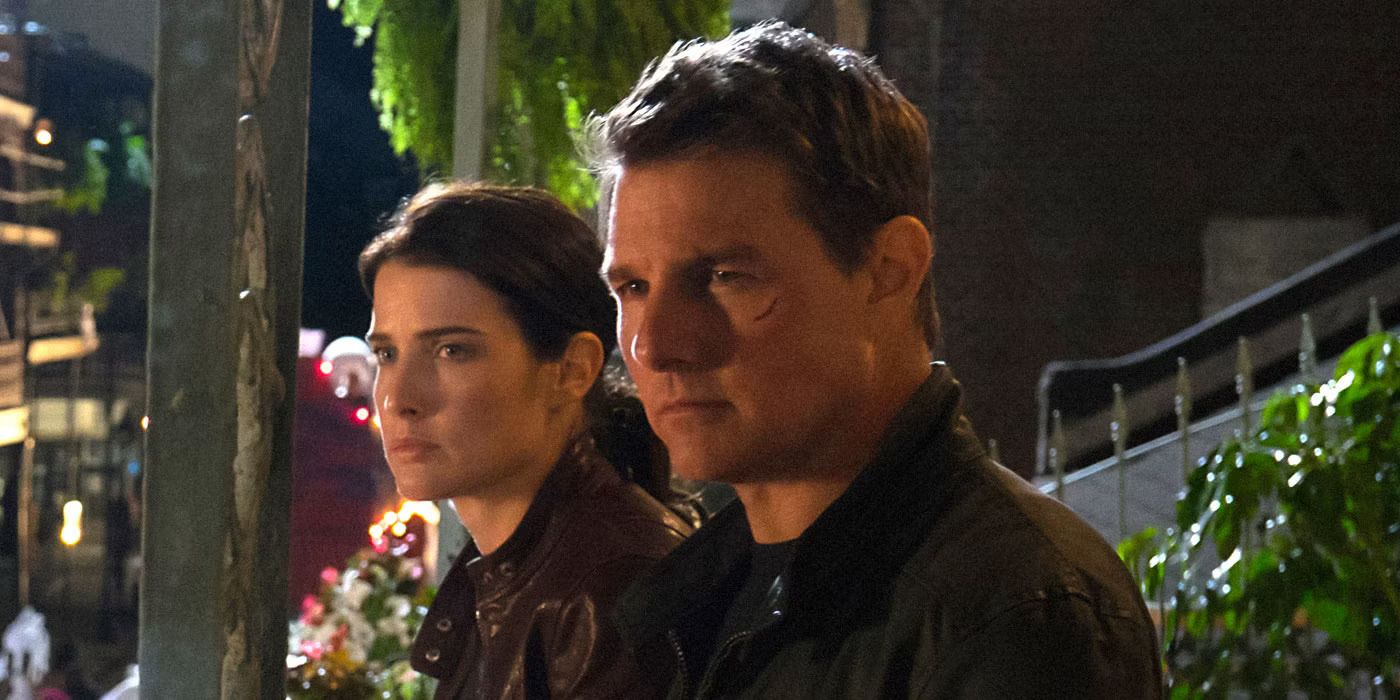 Jack Reacher (Tom Cruise) and Susan Turner (Colbie Smulders) looking offscreen in Jack Reacher: Never Go Back