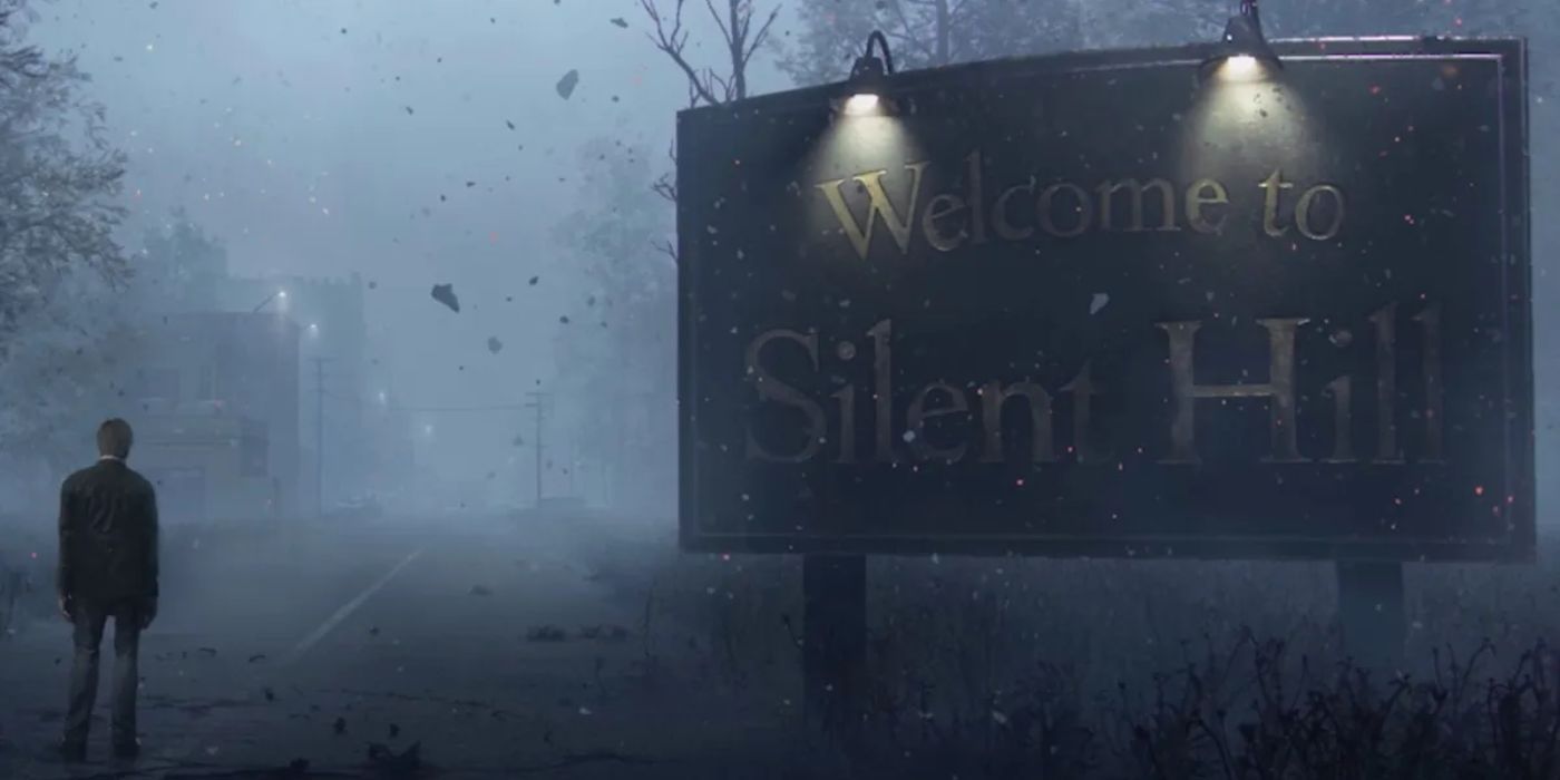 Man in the middle of a road next to a sign that says 'Welcome to Silent Hill'.