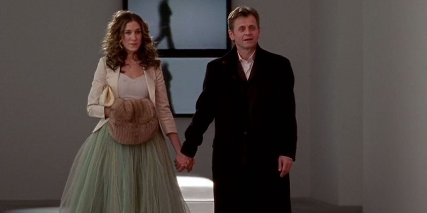 Carrie dressed up holding Petrovsky's hand in Sex and the City.