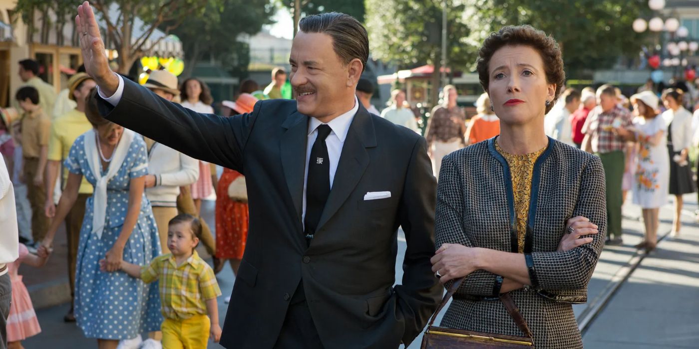 Walt Disney and P. L. Travers walk through a park together in 'Saving Mr. Banks' (2013)