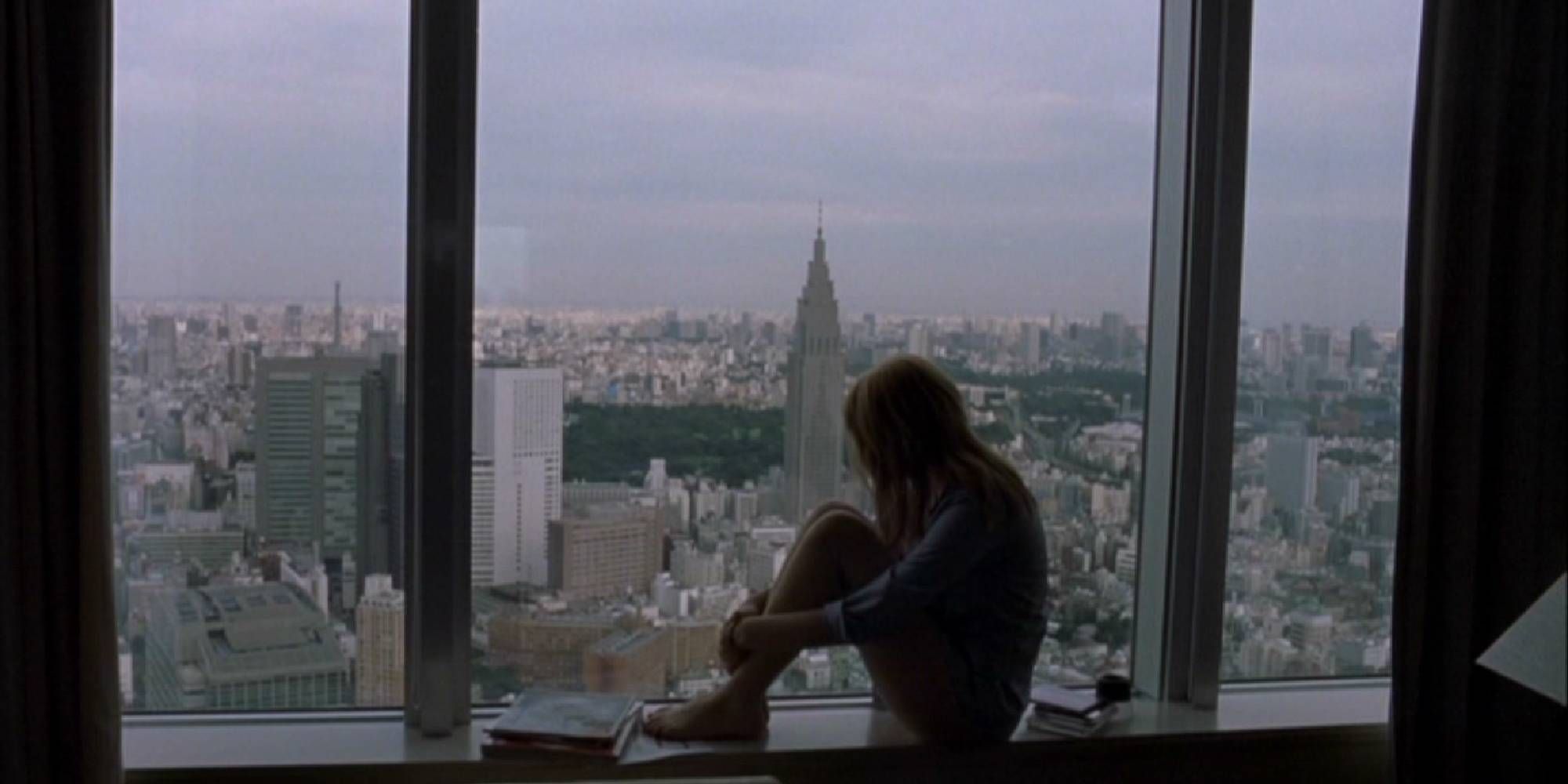 Scarlett Johansson sitting by the window in Lost in Translation.