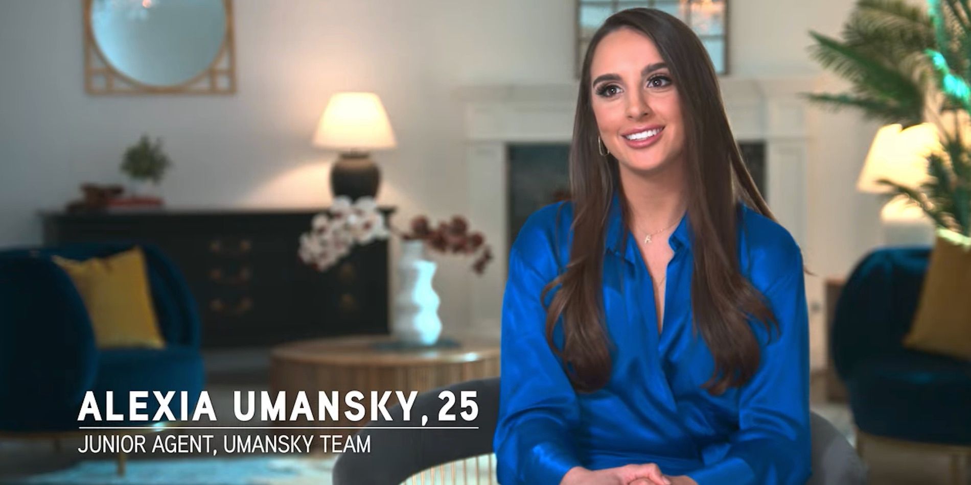 Alexia Umansky in an interview with a chyron on the screen with her name, age, and title