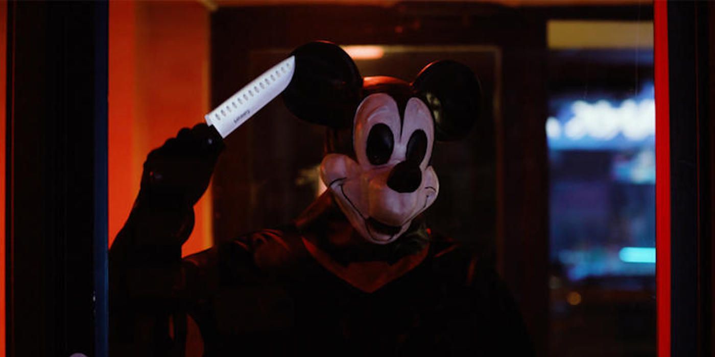 Mickey, holding a knife. in Mouse Trap