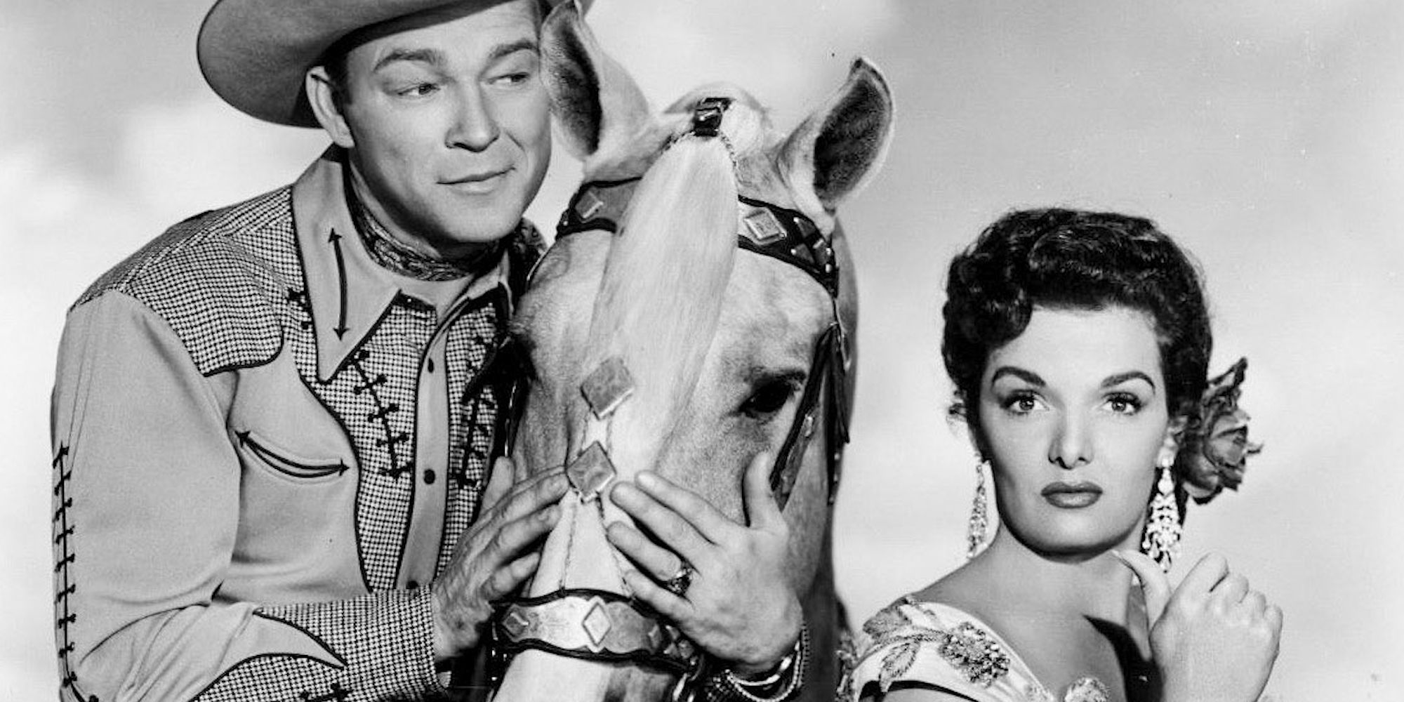 Roy Rogers and Jane Russell pose with a horse in Son of Paleface.