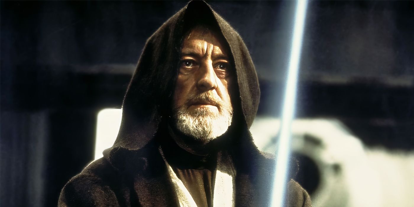 Alec Guinness as Obi-Wan Kenobi holding a lightsaber in Star Wars