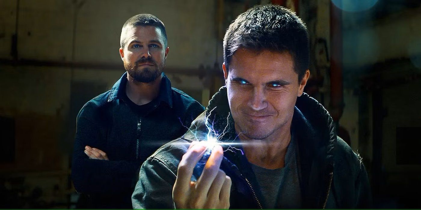 Robbie Amell as Garrett with lighting on his fingertips while Stephen Amell as Garrett stands with arms crossed