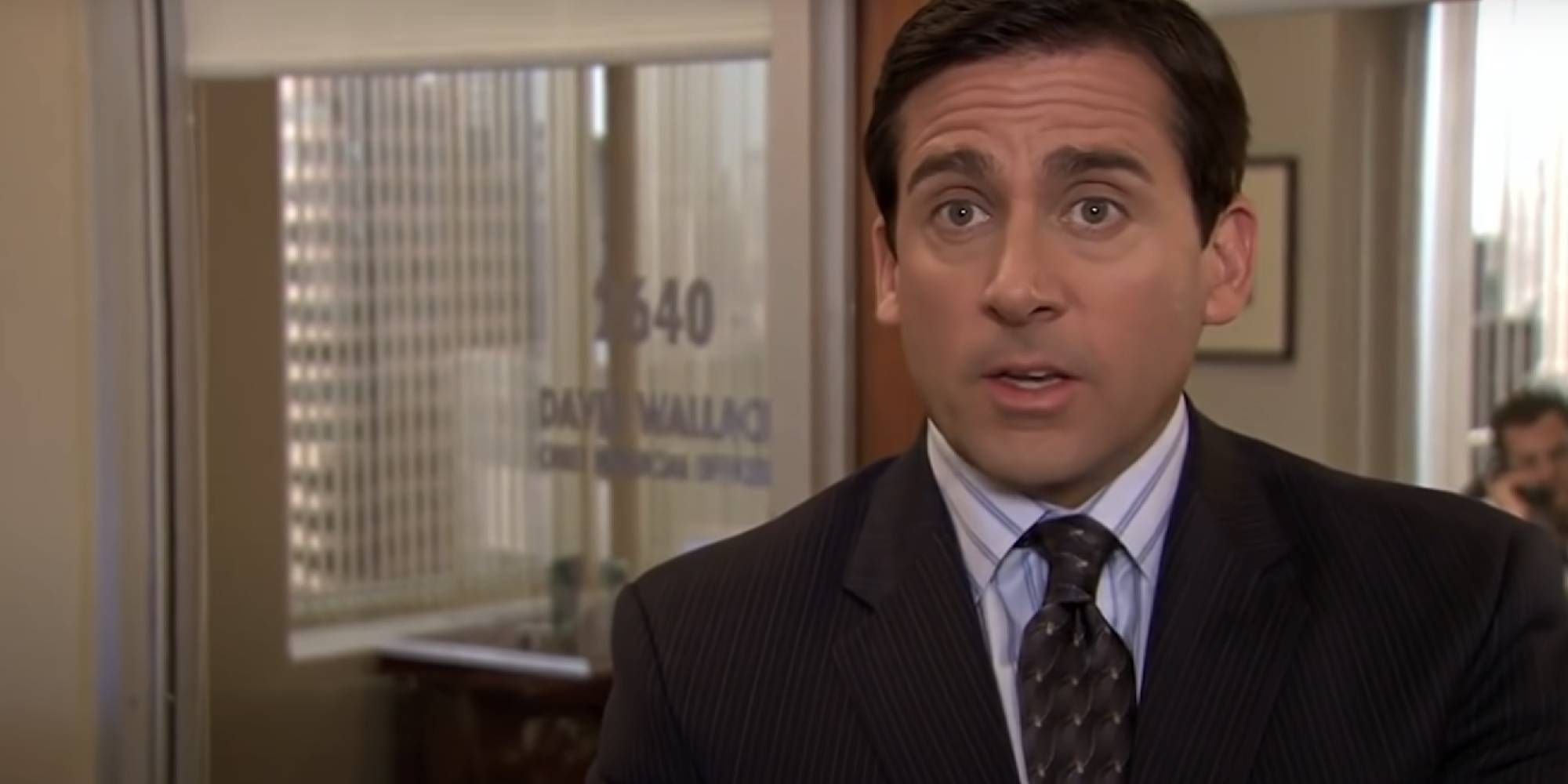 Steve Carrell as Michael Scott in The Office talking with the camera person