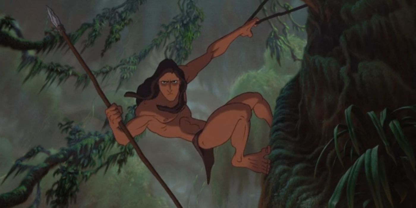 Tarzan armed with a spear, hanging off a tree with a vine in Disney's Tarzan