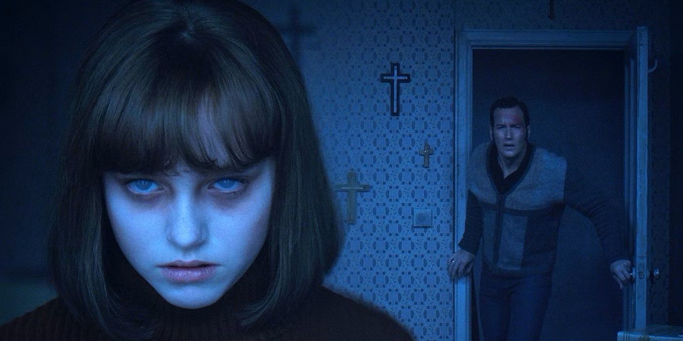Patrick Wilson as Ed Warren coming up behind Madison Wolfe as Janet Hodgson in The Conjuring 2